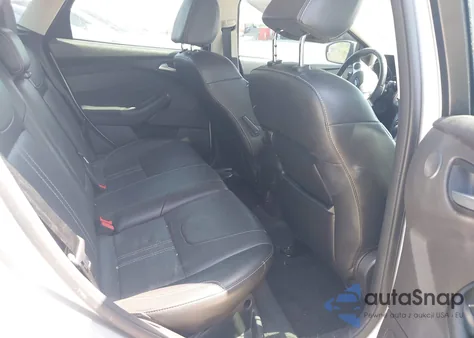 2014 Ford Focus Titanium from USA, damaged, VIN 1FADP3N22EL253809